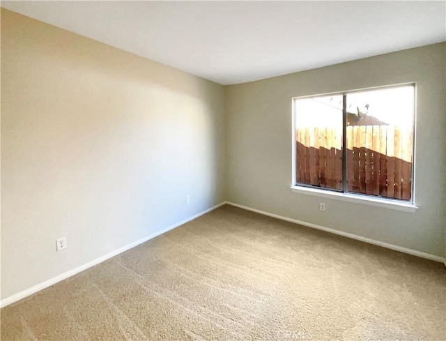 view of carpeted spare room