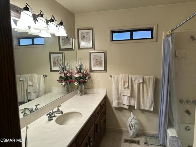 bathroom with vanity, tile patterned flooring, and shower / bath combination with curtain