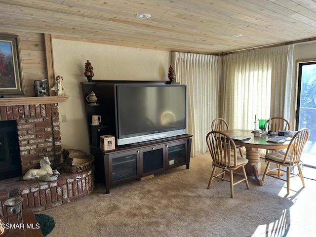 interior space with a fireplace, light colored carpet, and wood ceiling