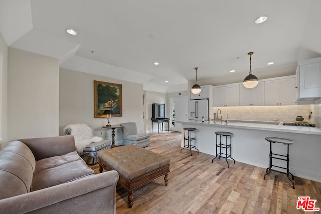 living room with light hardwood / wood-style floors