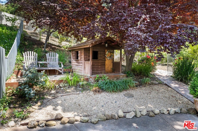 exterior space with a storage unit