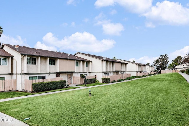 view of community with a lawn