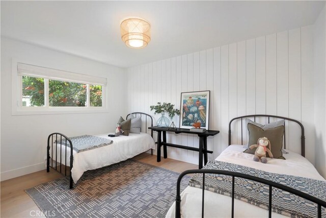 bedroom featuring wood-type flooring