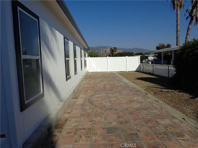 view of patio / terrace with a mountain view