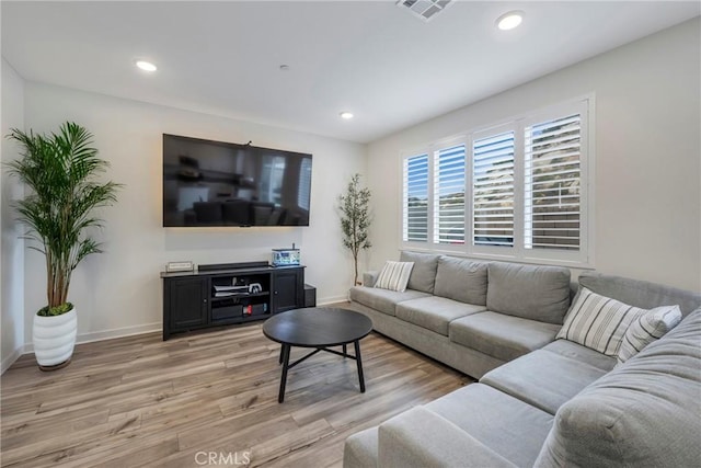 living room featuring light wood-type flooring