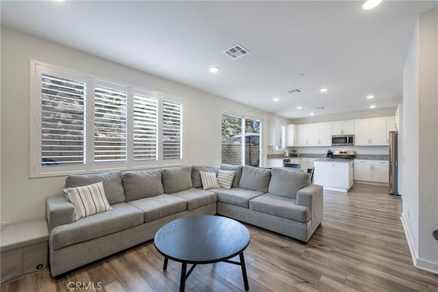 living room with light wood-type flooring