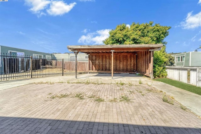 exterior space with a carport