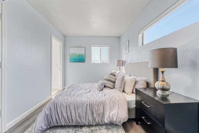 bedroom featuring hardwood / wood-style floors