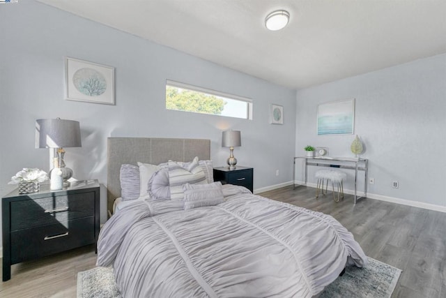 bedroom featuring hardwood / wood-style flooring