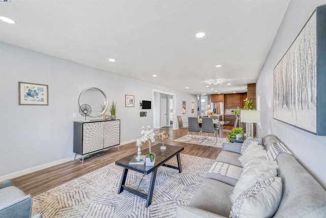 living room with light hardwood / wood-style floors