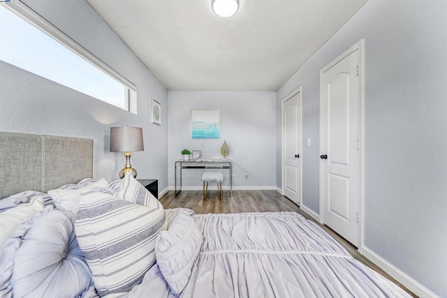 bedroom featuring wood-type flooring