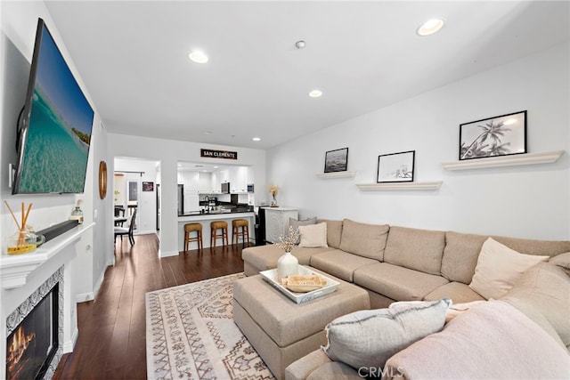 living room featuring dark hardwood / wood-style floors