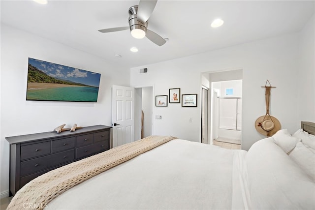 bedroom with ceiling fan and connected bathroom