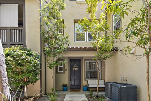 property entrance with central air condition unit