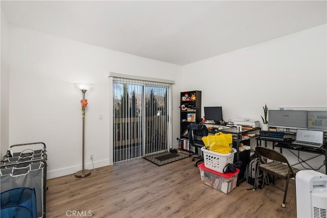 office area with hardwood / wood-style floors