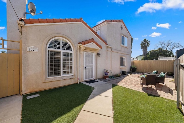 view of front of property with a patio area