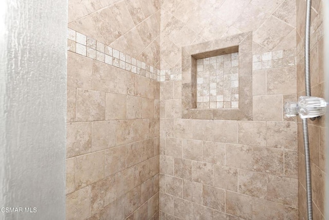 details featuring a tile shower