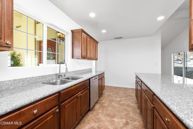 kitchen featuring stainless steel dishwasher and sink