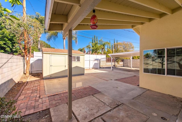 view of patio / terrace featuring a shed