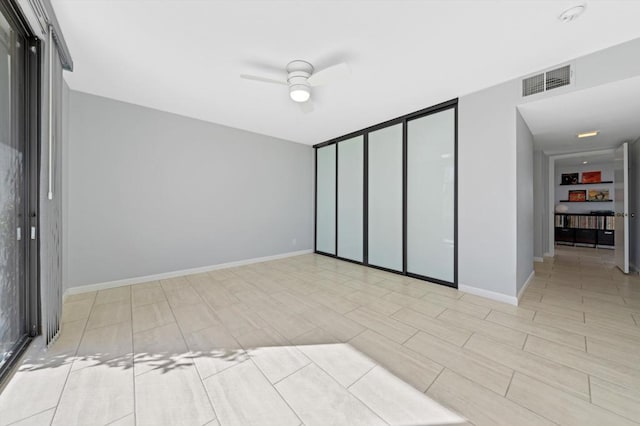 unfurnished bedroom featuring a closet and ceiling fan