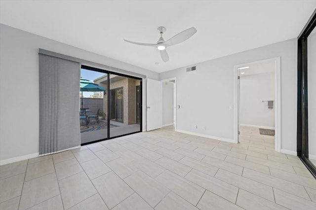 spare room with ceiling fan