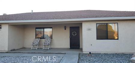 property entrance with covered porch