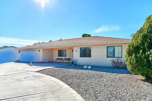 single story home with a garage