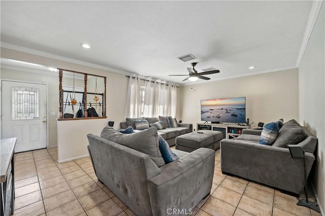 living room featuring ceiling fan, light tile patterned floors, and crown molding