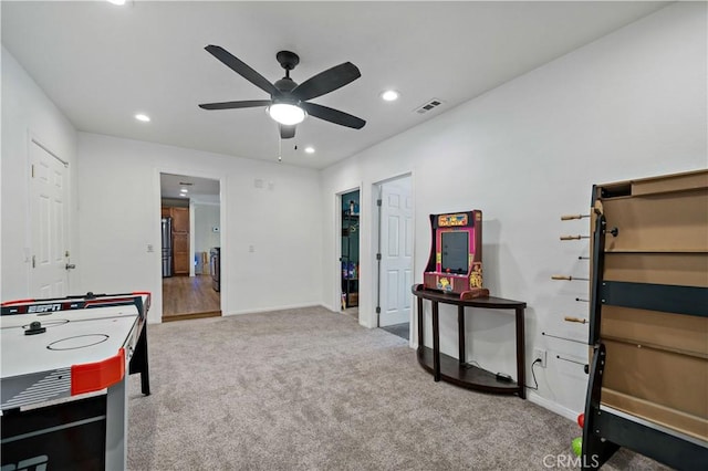 playroom featuring carpet floors and ceiling fan