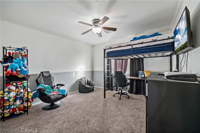 bedroom with ceiling fan, carpet, and ornamental molding