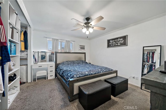 carpeted bedroom with crown molding and ceiling fan