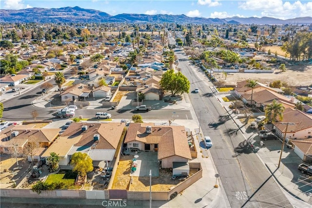 birds eye view of property featuring a mountain view