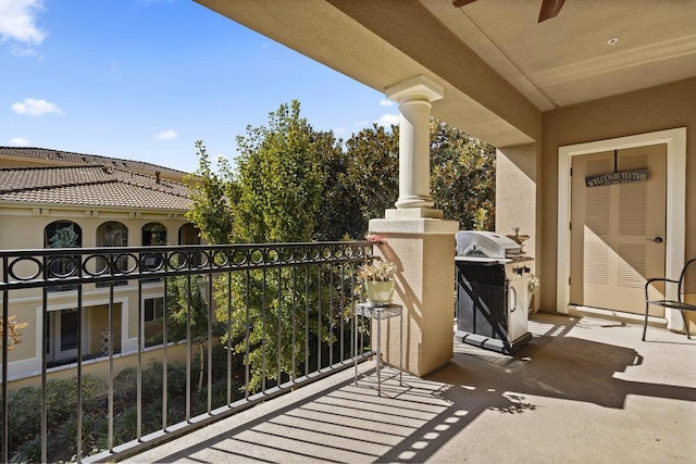 balcony featuring a grill and ceiling fan