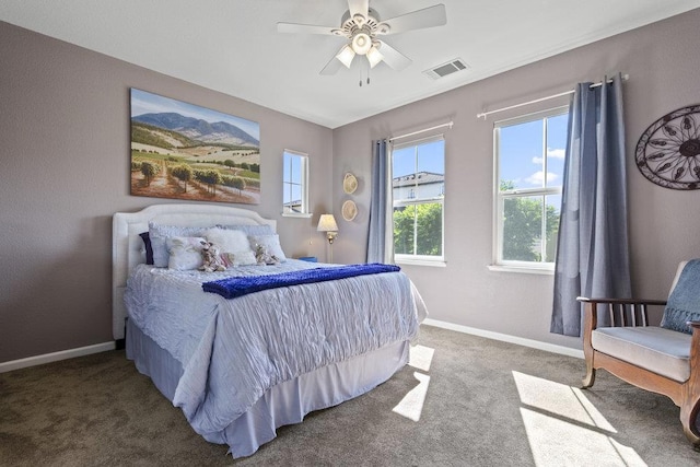 carpeted bedroom with ceiling fan