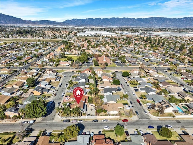 bird's eye view featuring a mountain view and a residential view