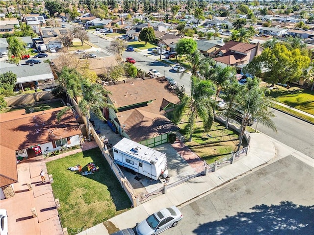 birds eye view of property with a residential view