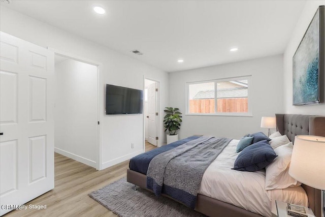 bedroom featuring light wood-type flooring