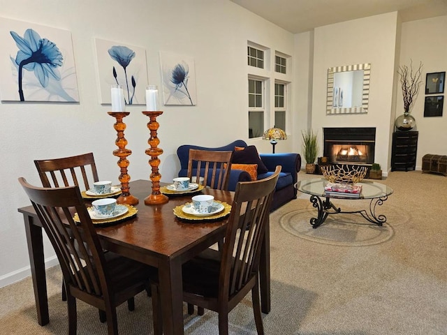 view of carpeted dining area