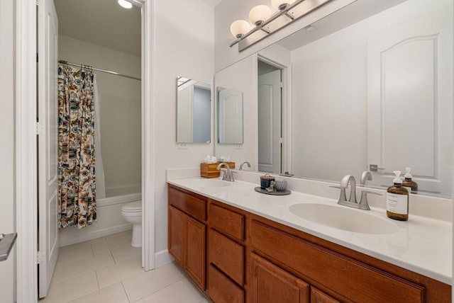 full bathroom featuring toilet, vanity, tile patterned floors, and shower / bath combo with shower curtain