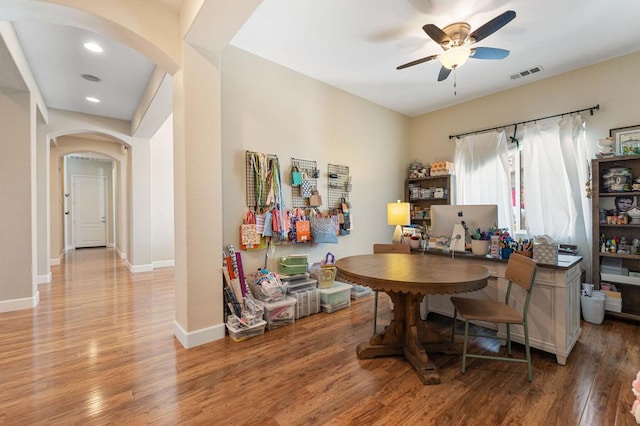 dining area featuring ceiling fan and hardwood / wood-style flooring