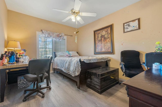 bedroom featuring ceiling fan and hardwood / wood-style floors