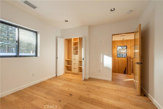 unfurnished bedroom featuring light hardwood / wood-style flooring