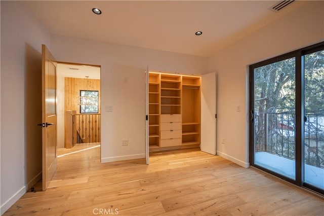 unfurnished bedroom featuring access to exterior, visible vents, recessed lighting, and light wood-type flooring