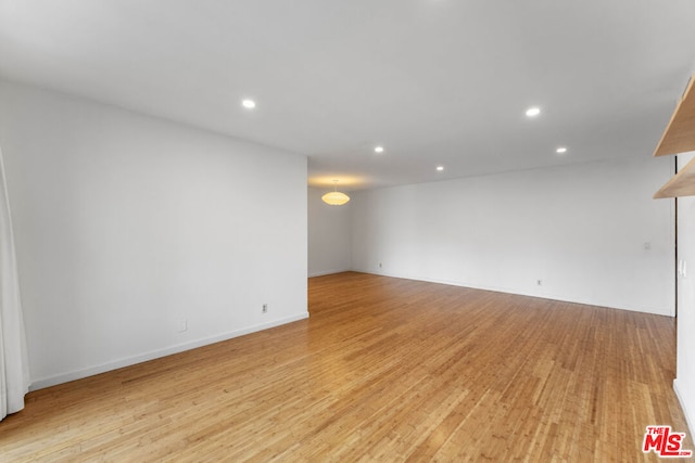 empty room featuring light hardwood / wood-style floors