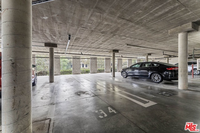 garage featuring a carport