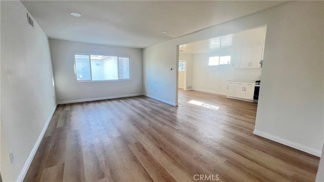 empty room featuring light hardwood / wood-style floors