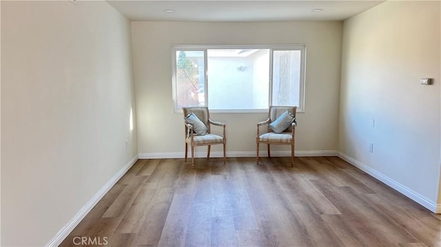 unfurnished room featuring light hardwood / wood-style floors