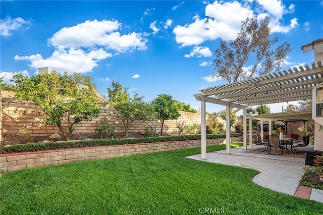 view of yard with a pergola and a patio area