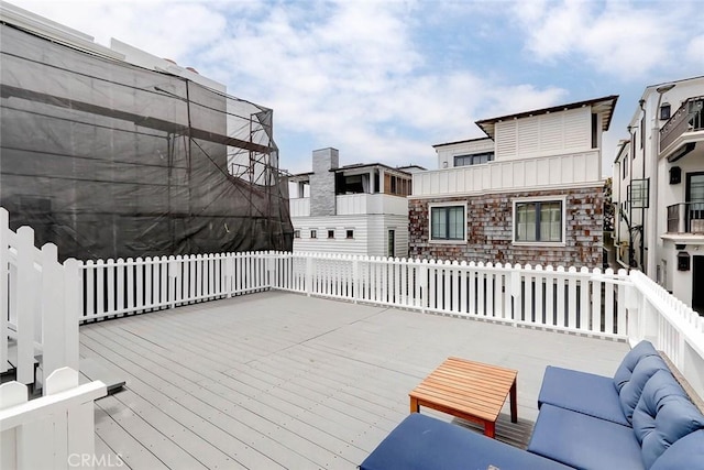 deck with an outdoor hangout area