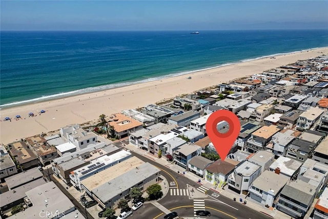 aerial view featuring a water view and a view of the beach